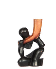 Hand Carved “Man With Horn” Statue (shelf 2)