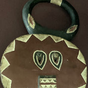 Hand carved Goli Mask (Maroon) (left hallway wall)