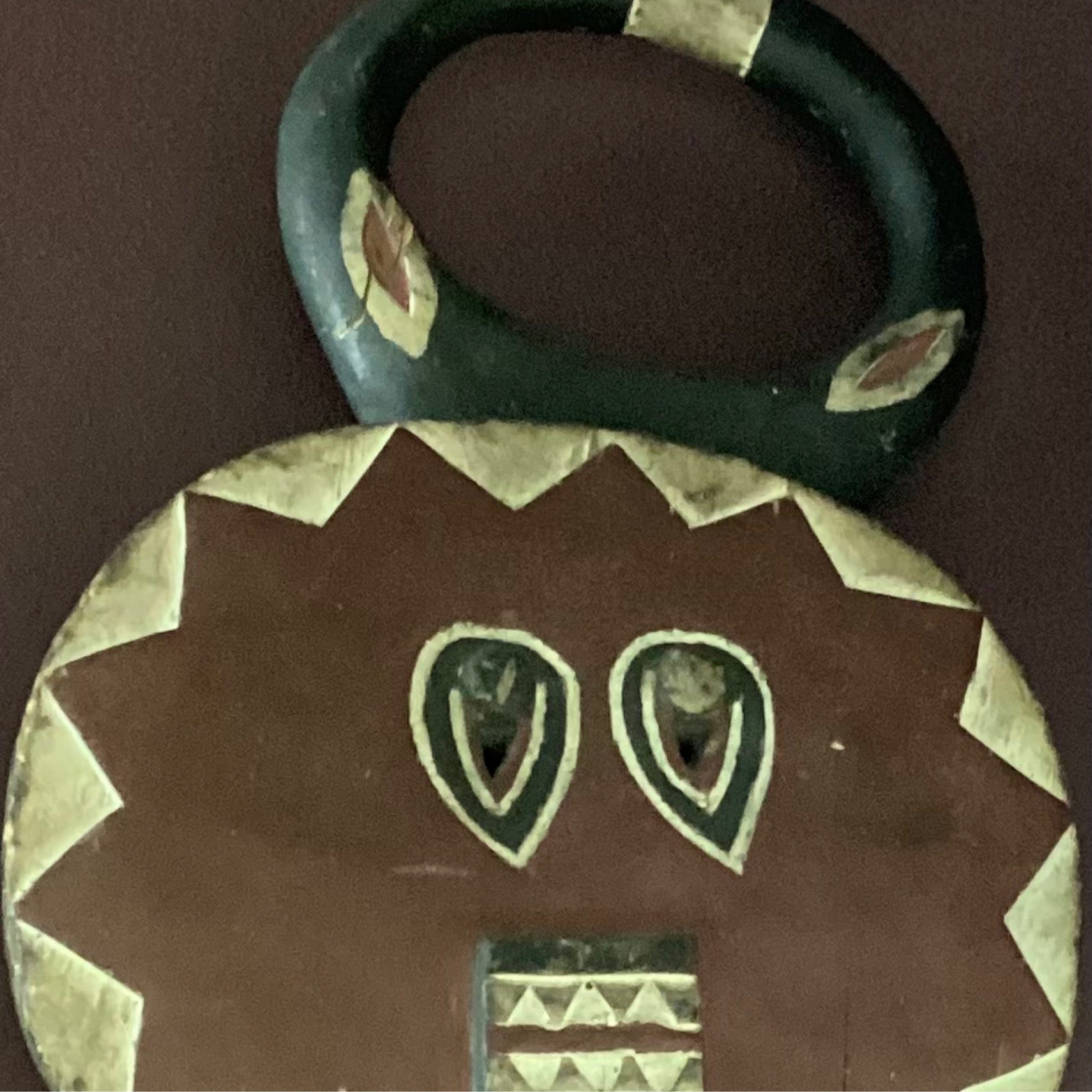 Hand carved Goli Mask (Maroon) (left hallway wall)