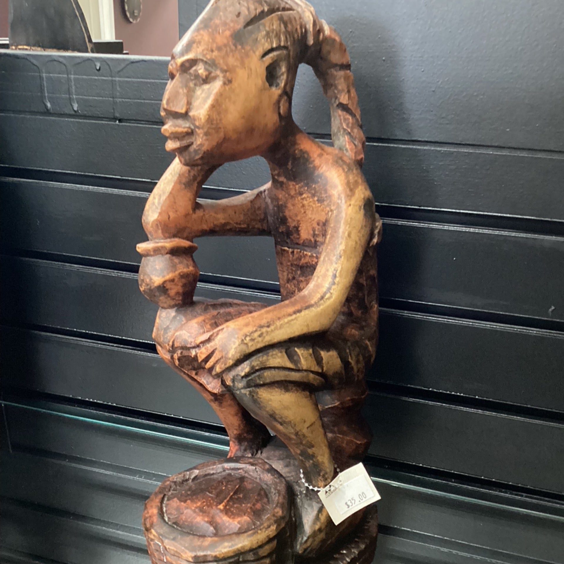 Hand Carved Sitting Man with Basket Statue (shelf 4)