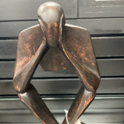 Hand Carved “Man With Hands On Face” Statue (shelf 2)