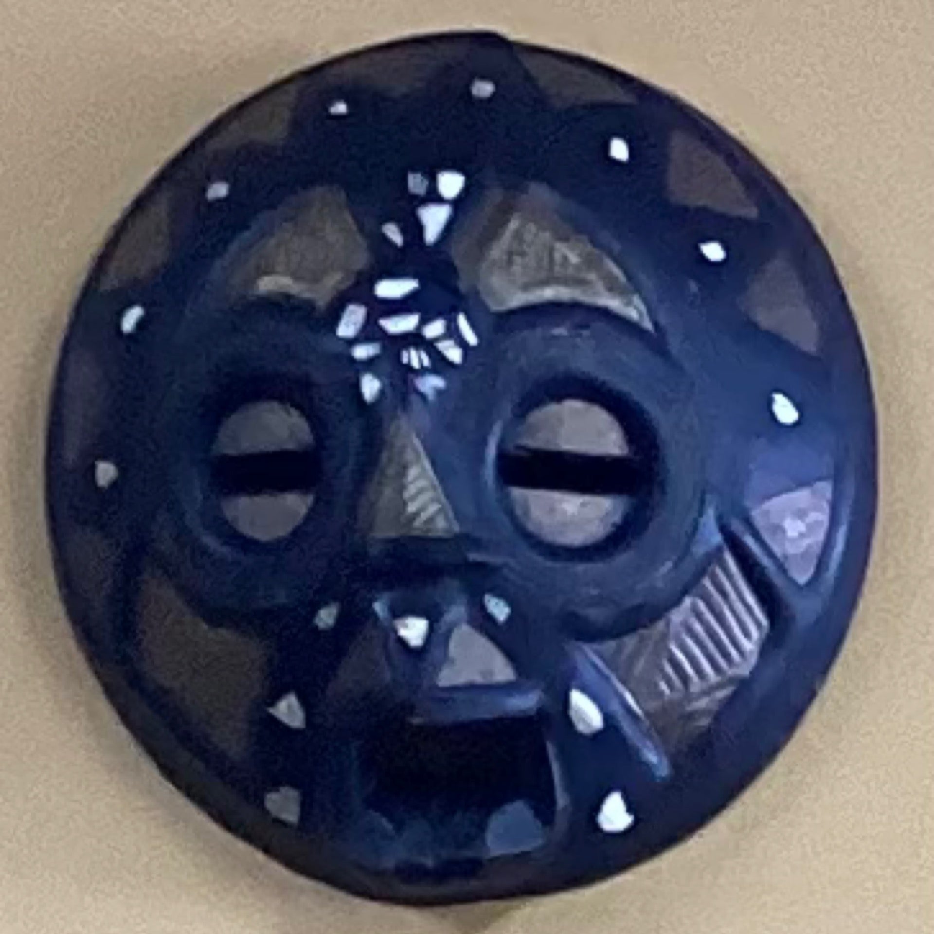 Hand carved circular wall mask (medium)