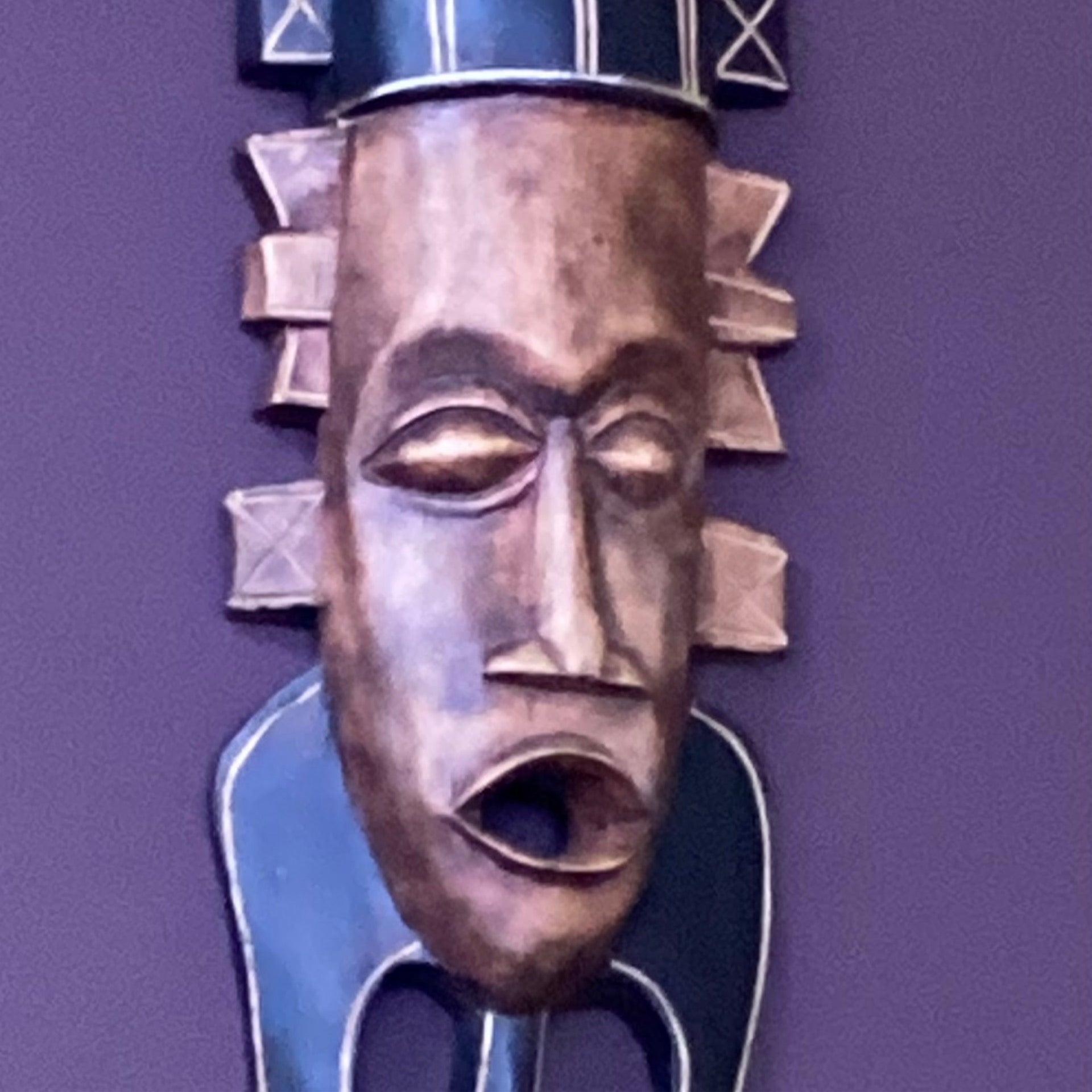 Hand carved African Mask (red and black) (right hallway wall)