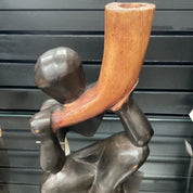 Hand Carved “Man With Horn” Statue (shelf 2)