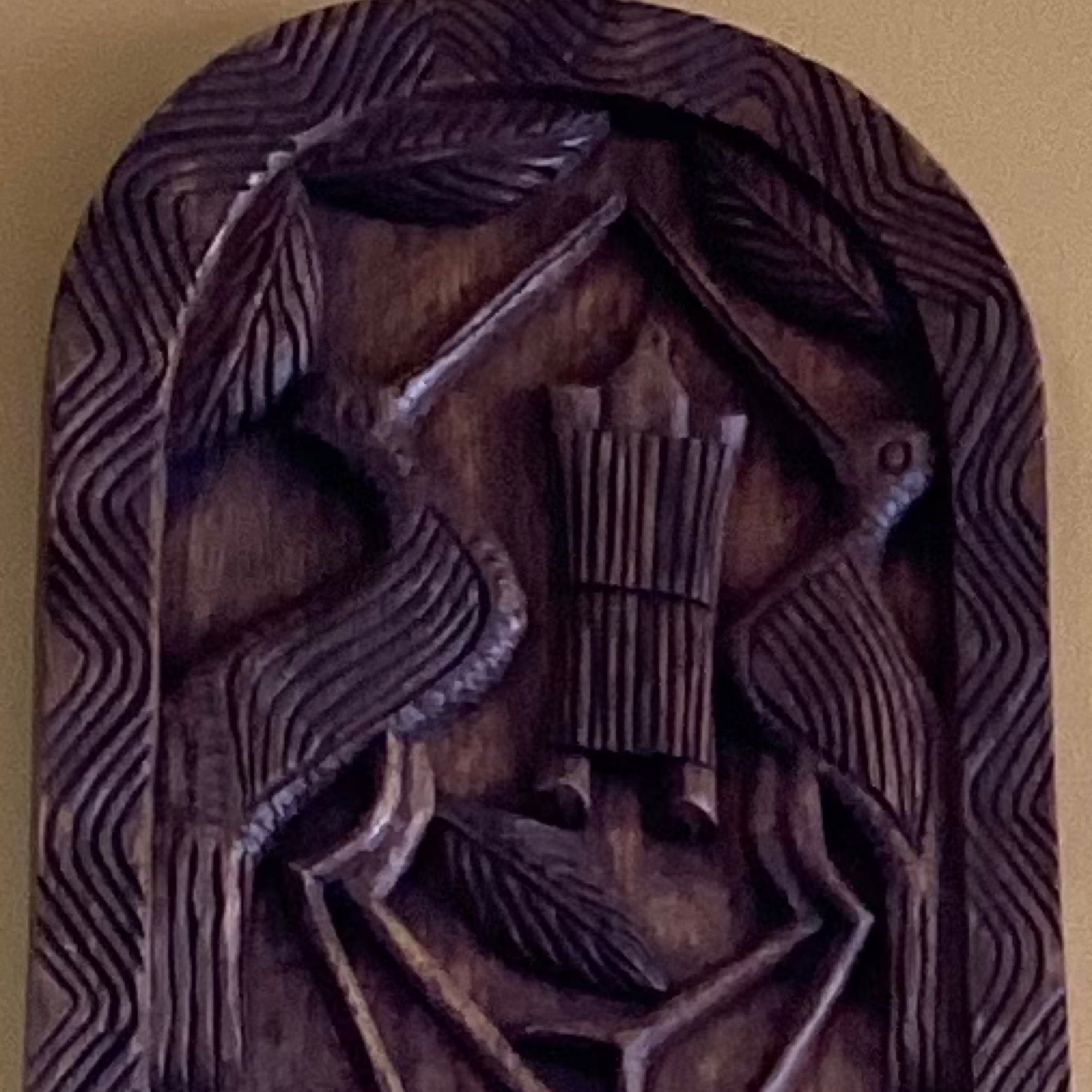 Hand carved animal wall hanging