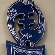 Hand carved Adinkra symbol wall hanging (medium)