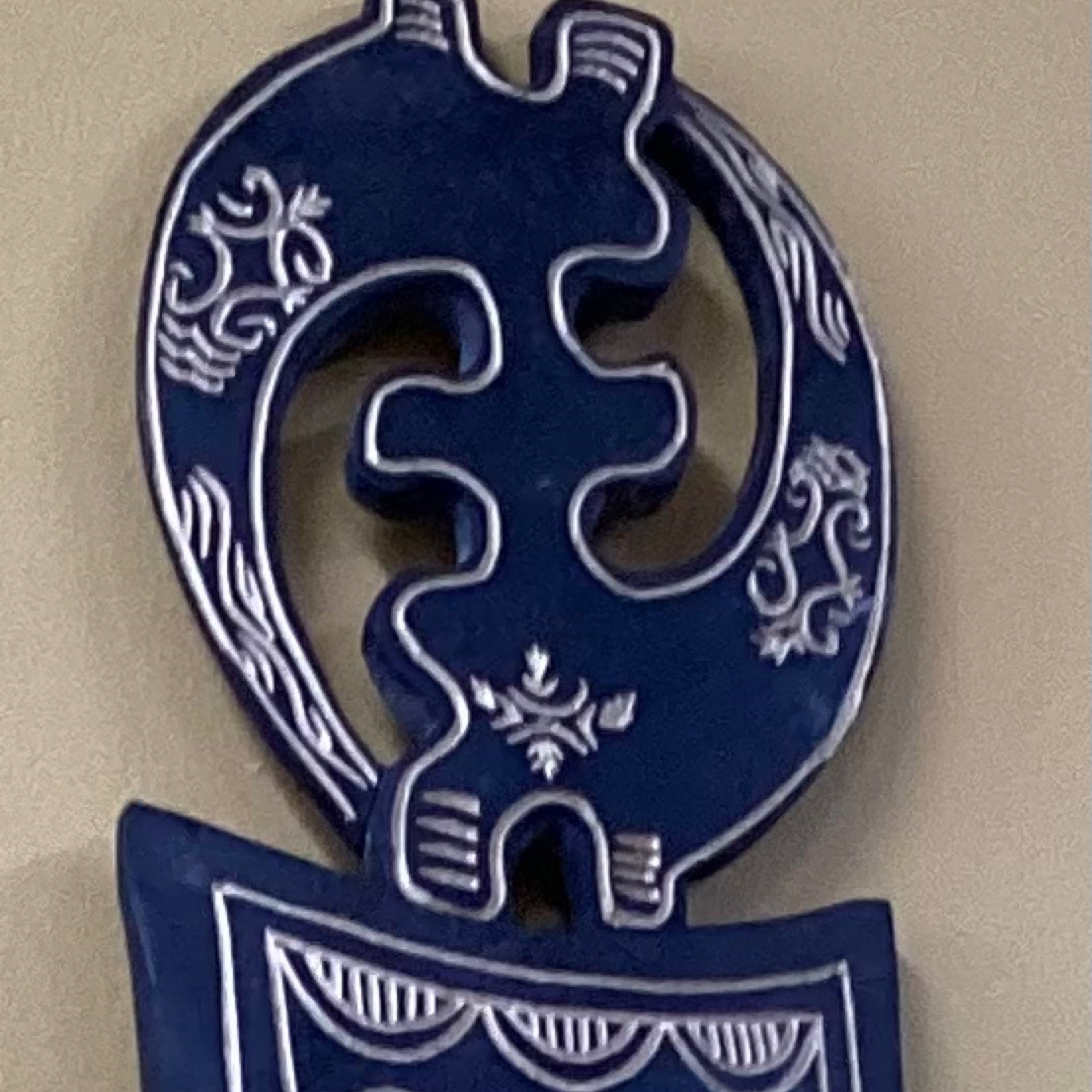 Hand carved Adinkra symbol wall hanging (medium)