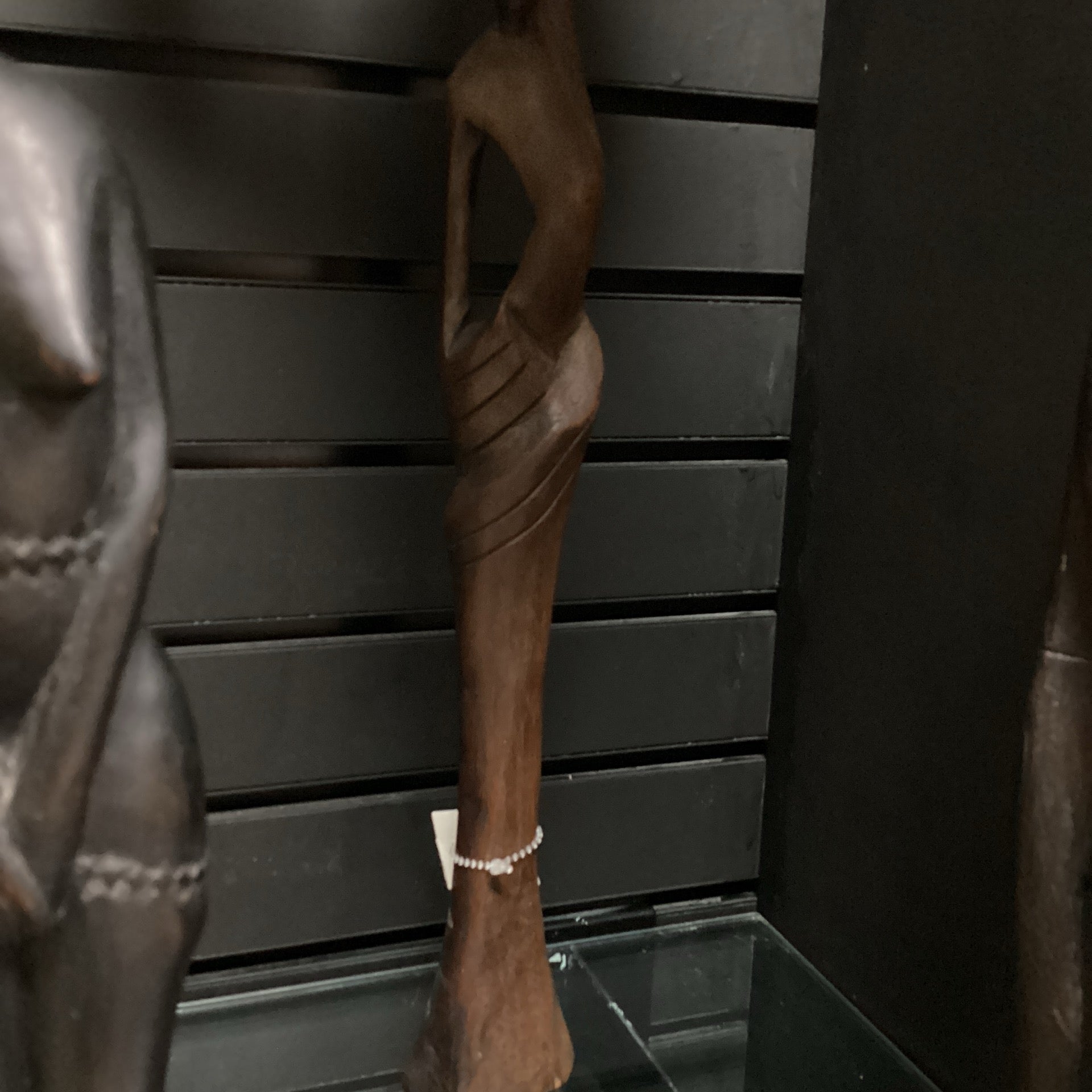 Hand Carved “Village Woman Bearing Water” (Shelf 12)