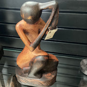 Hand Carved Sitting Woman Braiding Hair (Shelf 3)